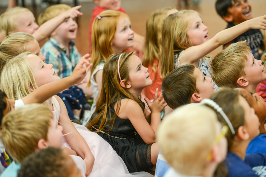 enrapt children at mr banana head birthday magic show